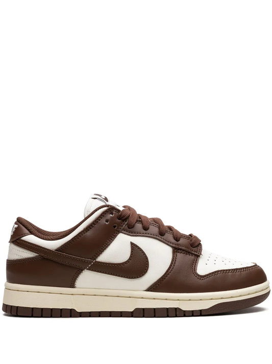 Nike Dunk Low low-top sneakers with white leather panels, brown overlays, lace-up design