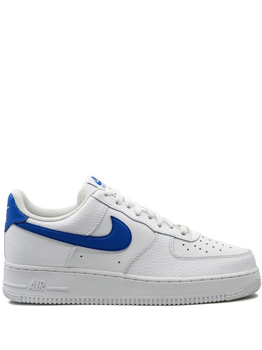 Nike Air Force 1 Low sneaker, white leather with blue swoosh and lace-up