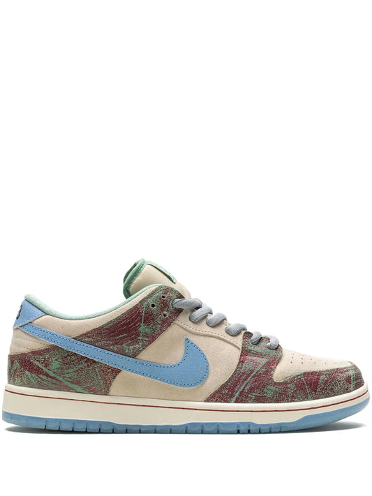 Nike SB Dunk Low low-top skate shoes, beige canvas with blue swoosh and lace-up