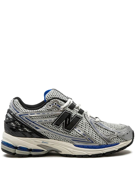 New Balance low-top sneakers with black, gray mesh and blue accents
