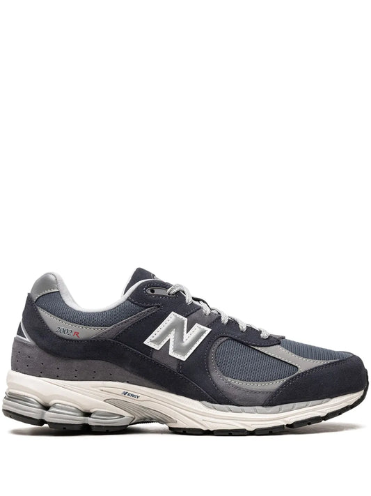 New Balance 2002R running sneaker in dark navy/gray with N logo and padded collar
