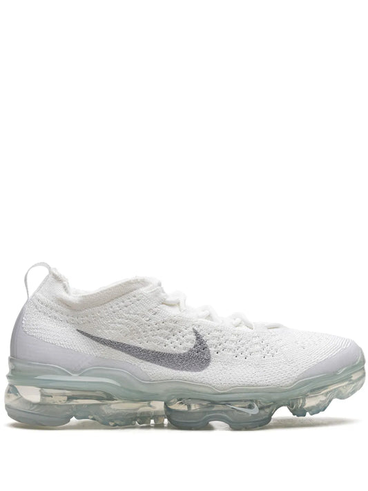 Nike Vapormax 2023 Flyknit white sneaker with black swoosh and clear Air sole