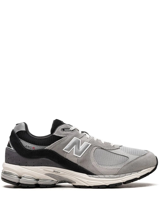 New Balance 2002R sneaker with gray mesh upper and black suede overlays