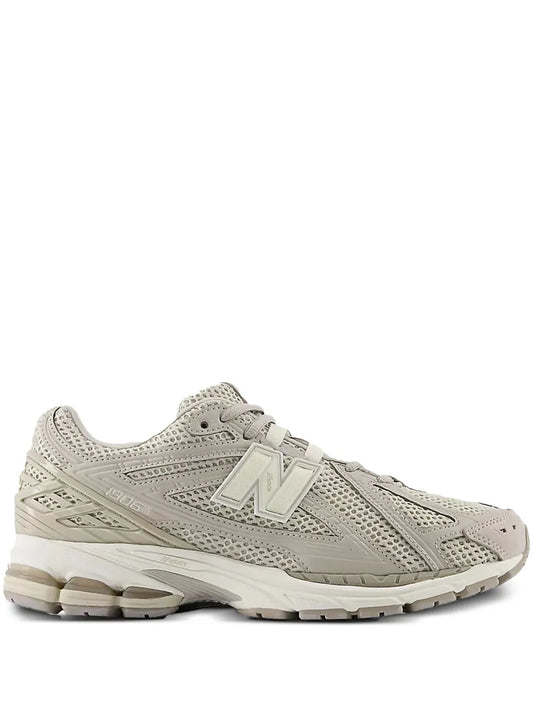Light grey New Balance 1906R lace-up sneakers, mesh upper and N logo