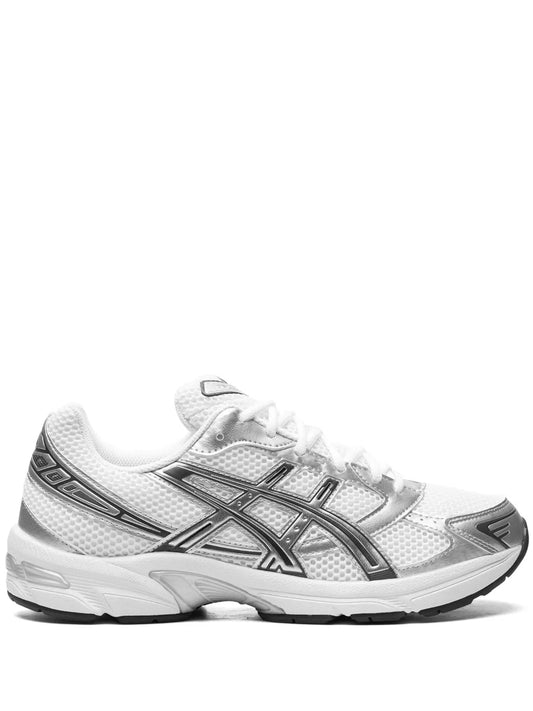 ASICS Gel-1130 white running shoe with silver/gray side stripes and black heel detail
