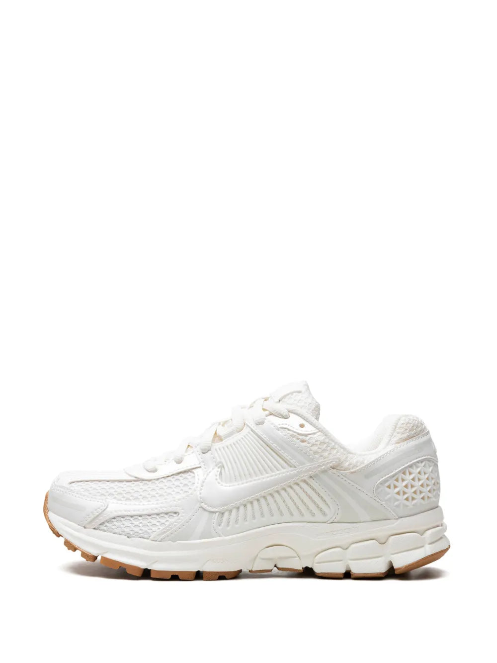 White Nike running sneakers, front-side view with lace-up closure, swoosh, and textured panels
