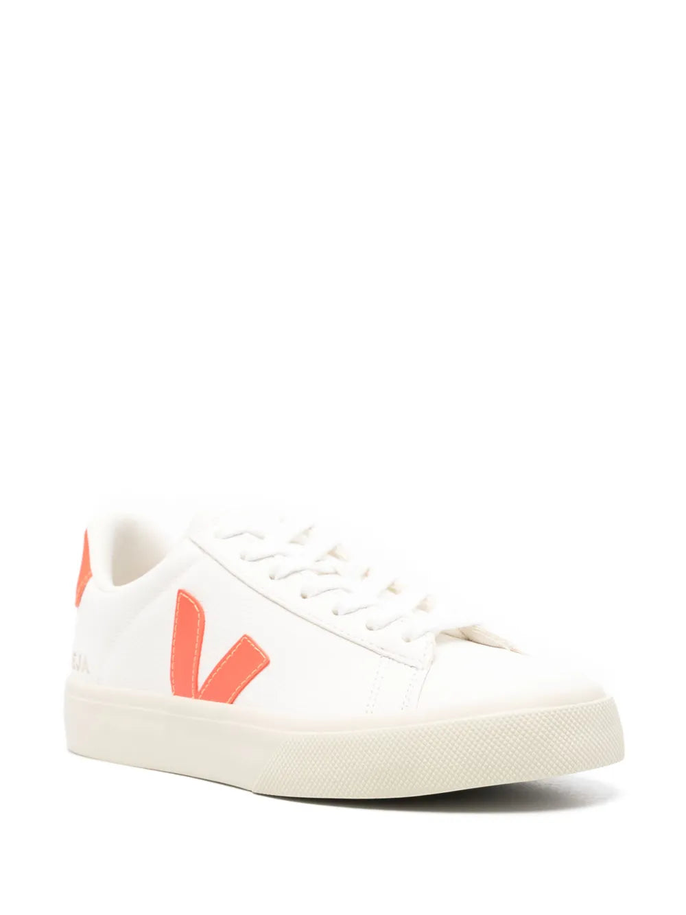 White low-top sneakers, orange V logo on side, lace-up front