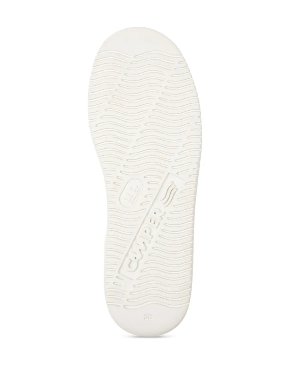 White sneaker outsole with textured traction pattern