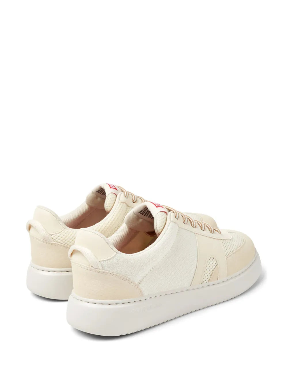White low-top sneaker, heel and side view, padded collar and rubber sole
