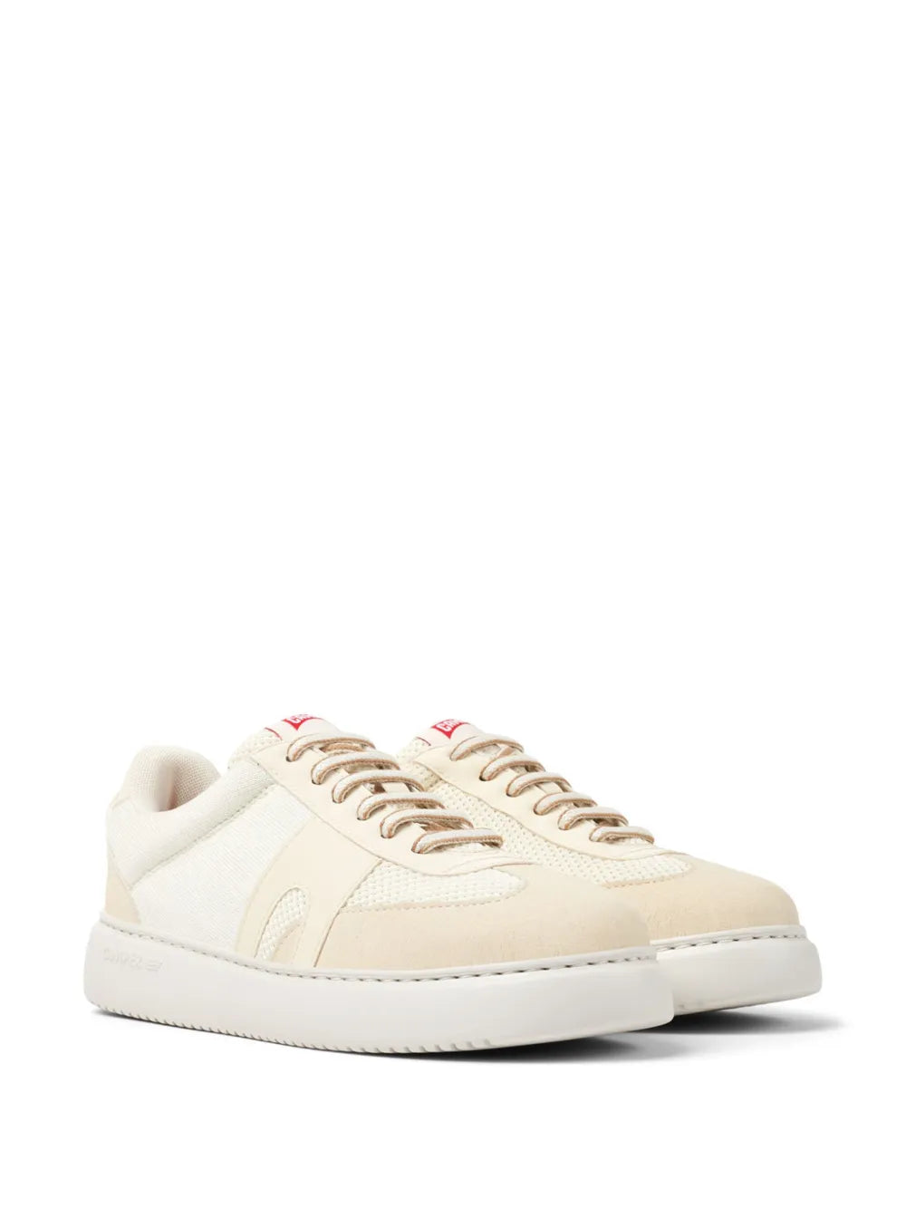White low-top sneaker, front three-quarter view, lace-up with padded collar