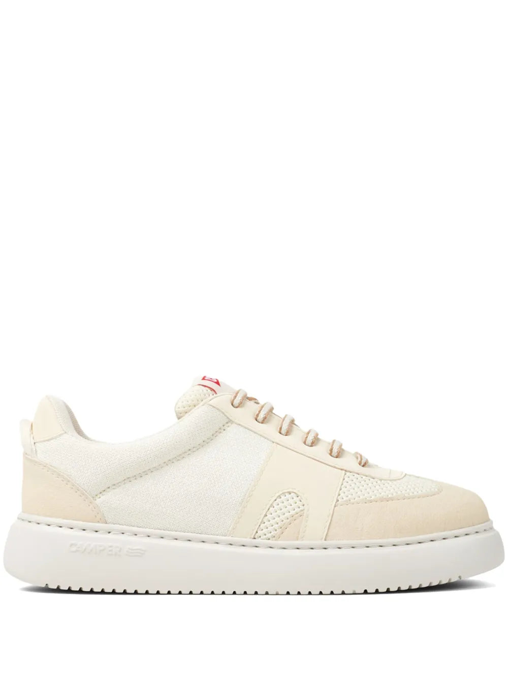 White low-top sneaker with lace-up front and stitched side panel details