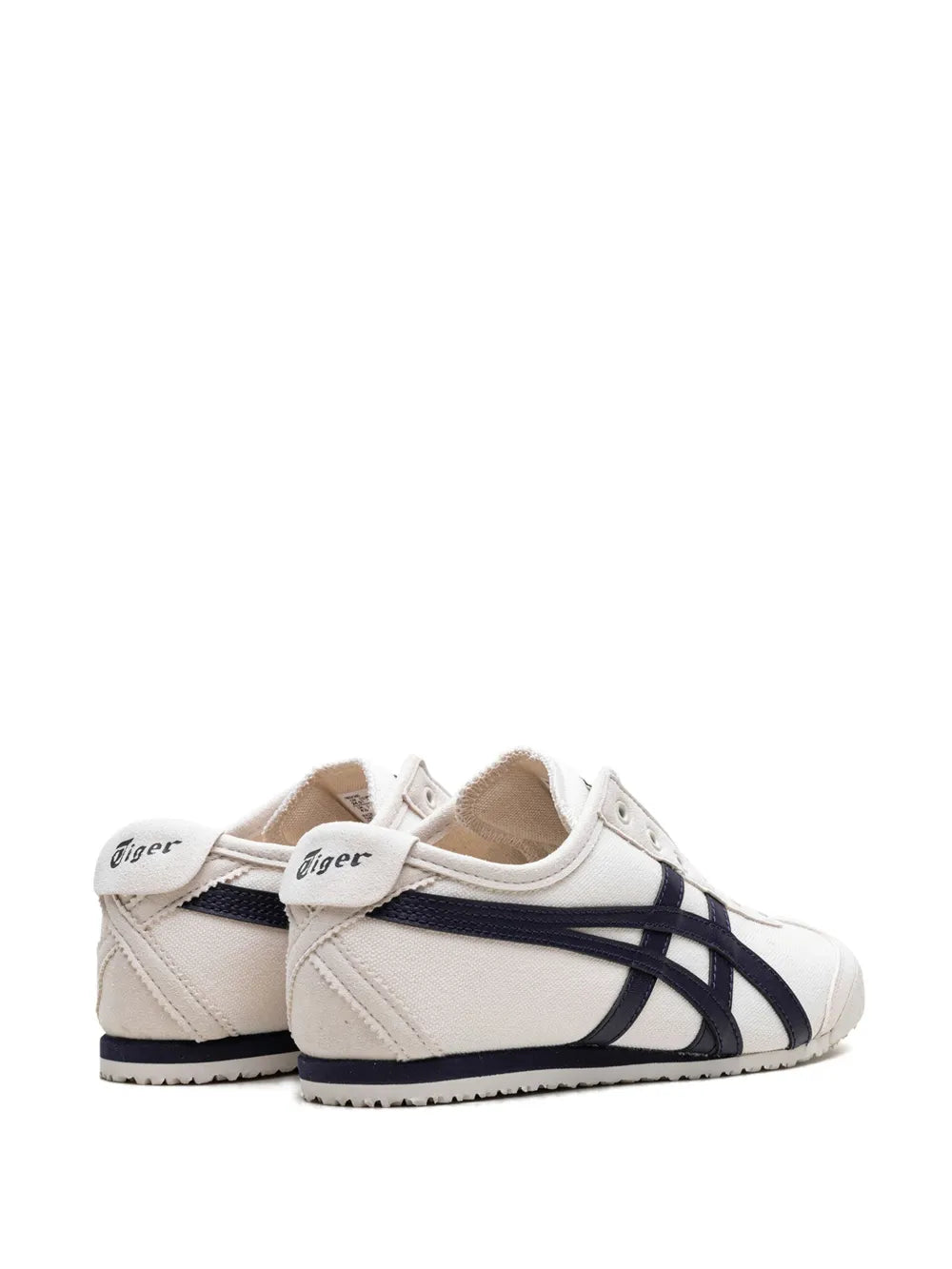 Low-top sneakers with navy side stripes, white upper, and heel logo tabs
