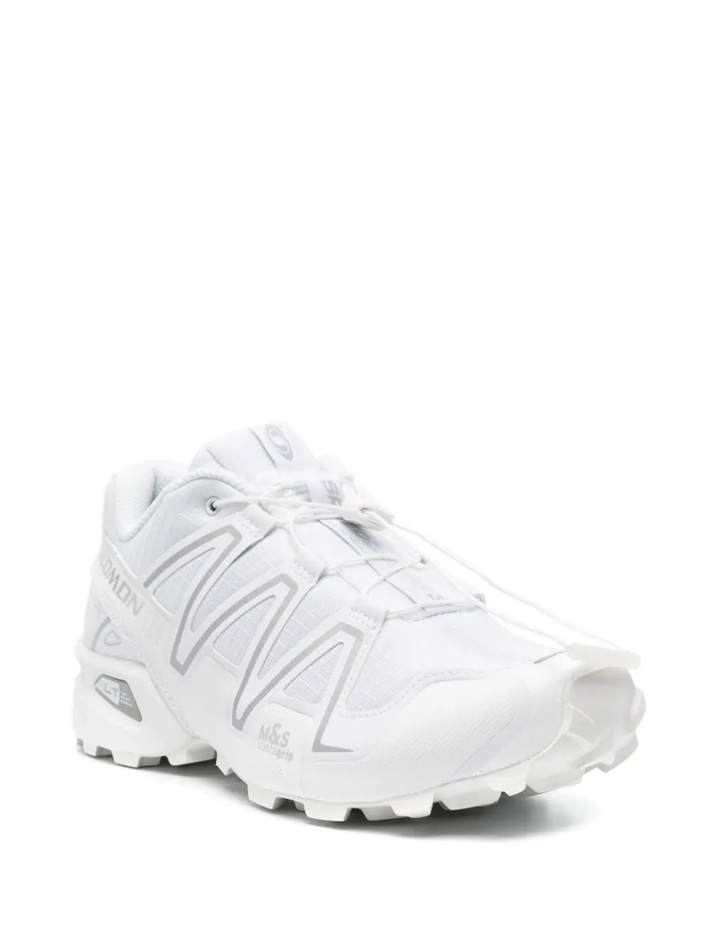 White trail running shoe with lace-up front and rugged lug outsole