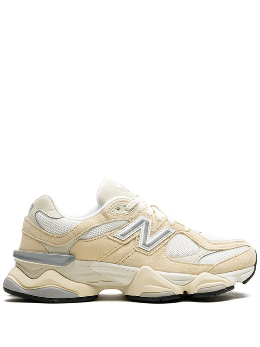Beige New Balance 9060 running sneaker with N logo and lace-up design