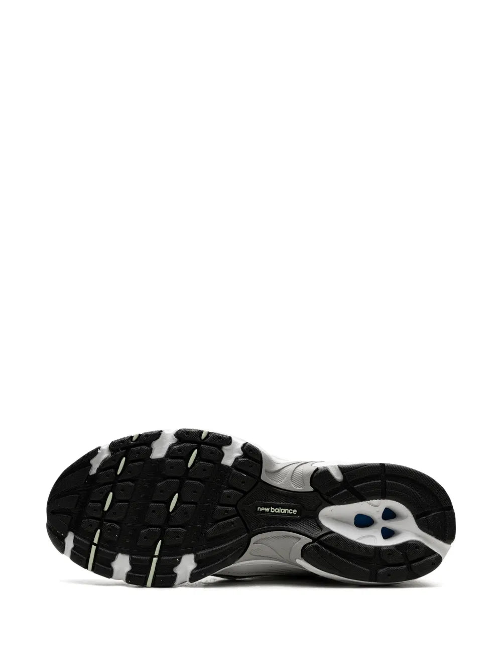 Black rubber outsole with deep tread and white midsole edge