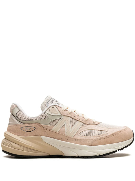Pink New Balance 990V6 running sneaker with lace-up front and cream overlays