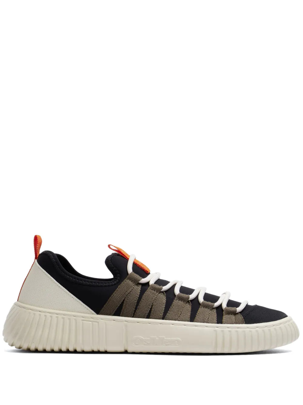 Black and off-white low-top sneakers with orange heel pull tab and white rubber sole