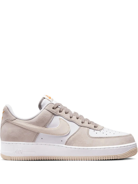 Nike Air Force 1 Low '07 low-top sneakers in light brown and white, lace-up