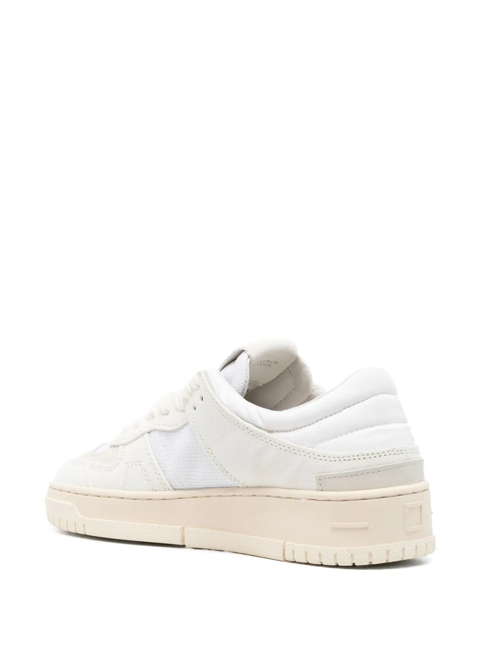 White low-top lace-up sneaker, padded collar, panel stitching, beige chunky sole