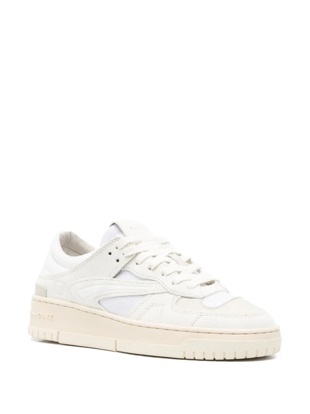 White low-top lace-up sneaker with panelled upper and textured beige sole