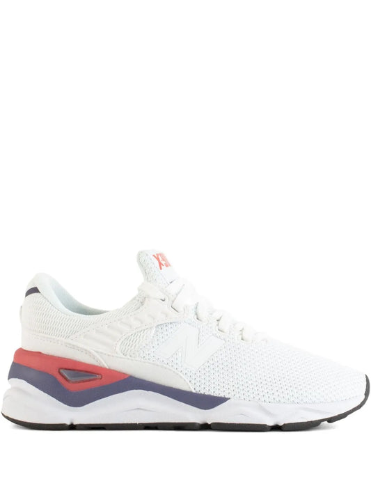 White New Balance X-90 running sneaker with mesh upper and lace-up front