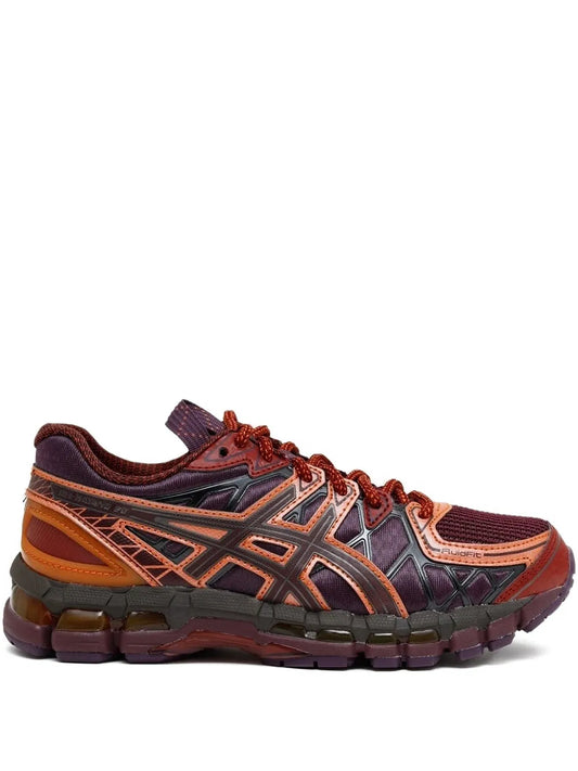 ASICS orange lace-up running sneakers with navy panels and orange ASICS stripes