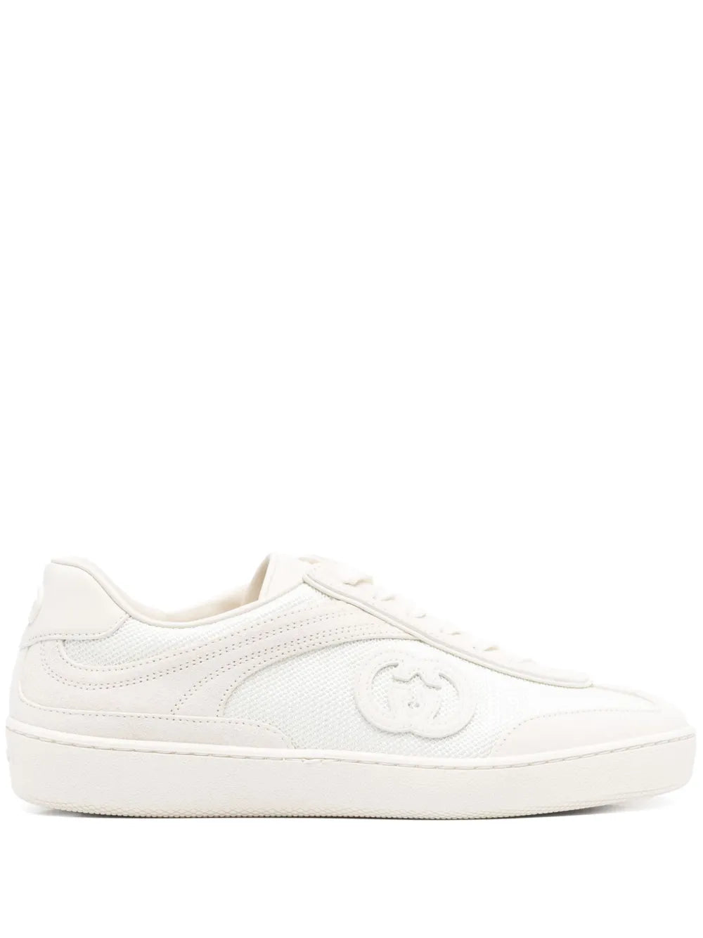 White low-top sneaker with logo detail and lace-up front