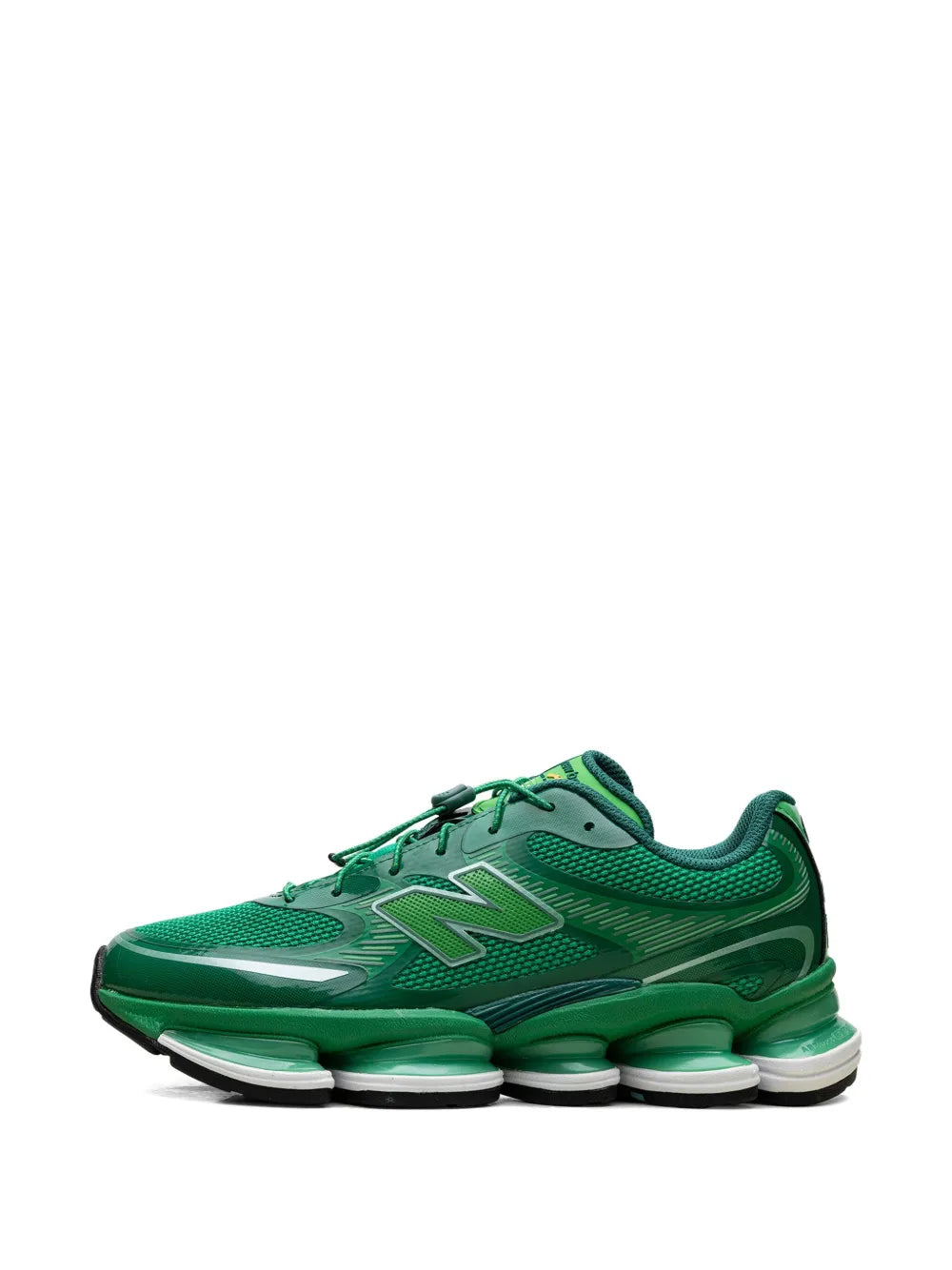 Green low-top sneakers with lace-up front and stacked cushioned pods
