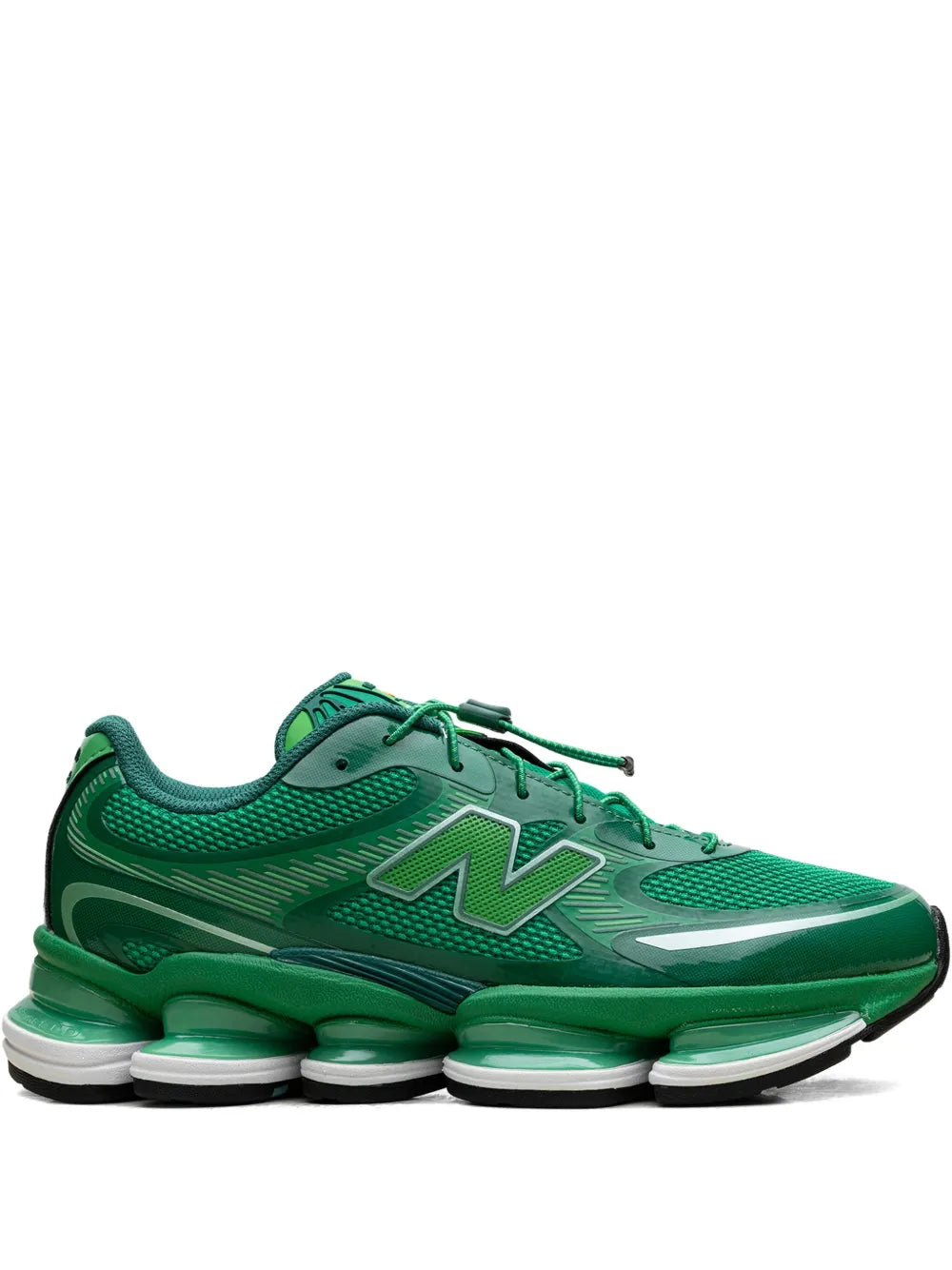 Green New Balance low-top sneakers with N logo and lace-up design