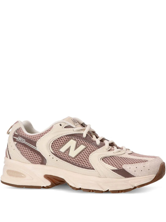 New Balance 530 mesh trainers in cream and mauve with N logo and lace-up front
