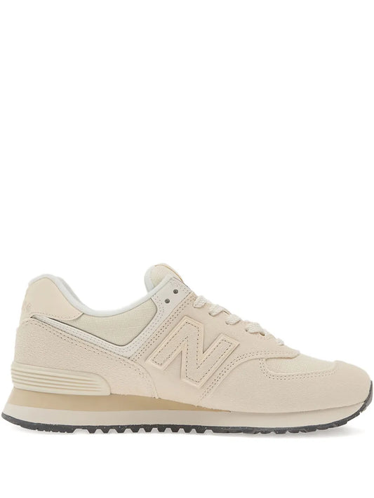 New Balance 574 beige lace-up low-top sneaker with N logo and rubber sole