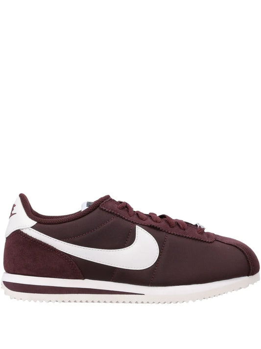 Nike Cortez low-top sneakers in dark maroon with white Swoosh and white outsole
