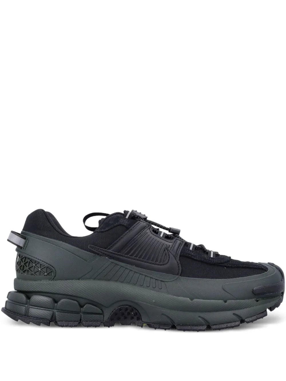 Nike Zoom Vomero trainers in black with dark green midsole and chunky rubber outsole