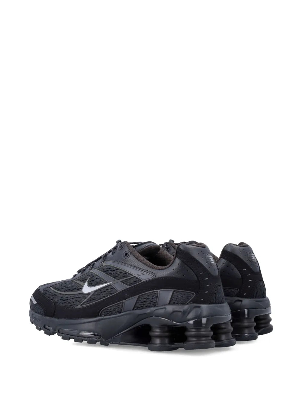 Black Nike Shox Ride 2 sneakers, 3/4 side view with rear heel pods