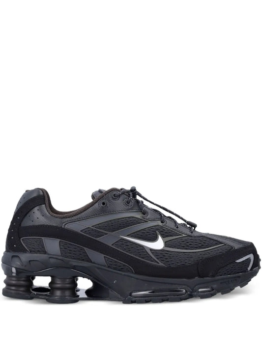 Black Nike Shox Ride 2 lace-up sneakers with Swoosh and visible foam heel pods