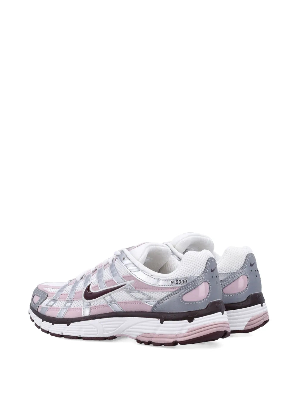 Nike white trainers with silver panels and pink heel detail, lace-up