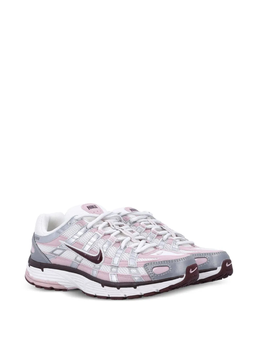 Nike white low trainers with mesh panels, pink trim, lace-up