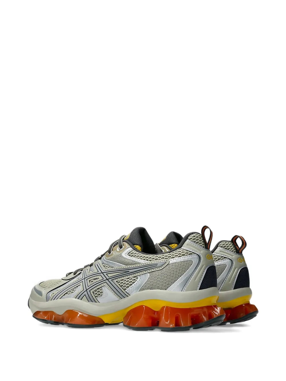 Grey running shoes with geometric panels, orange sole, and black heel trim