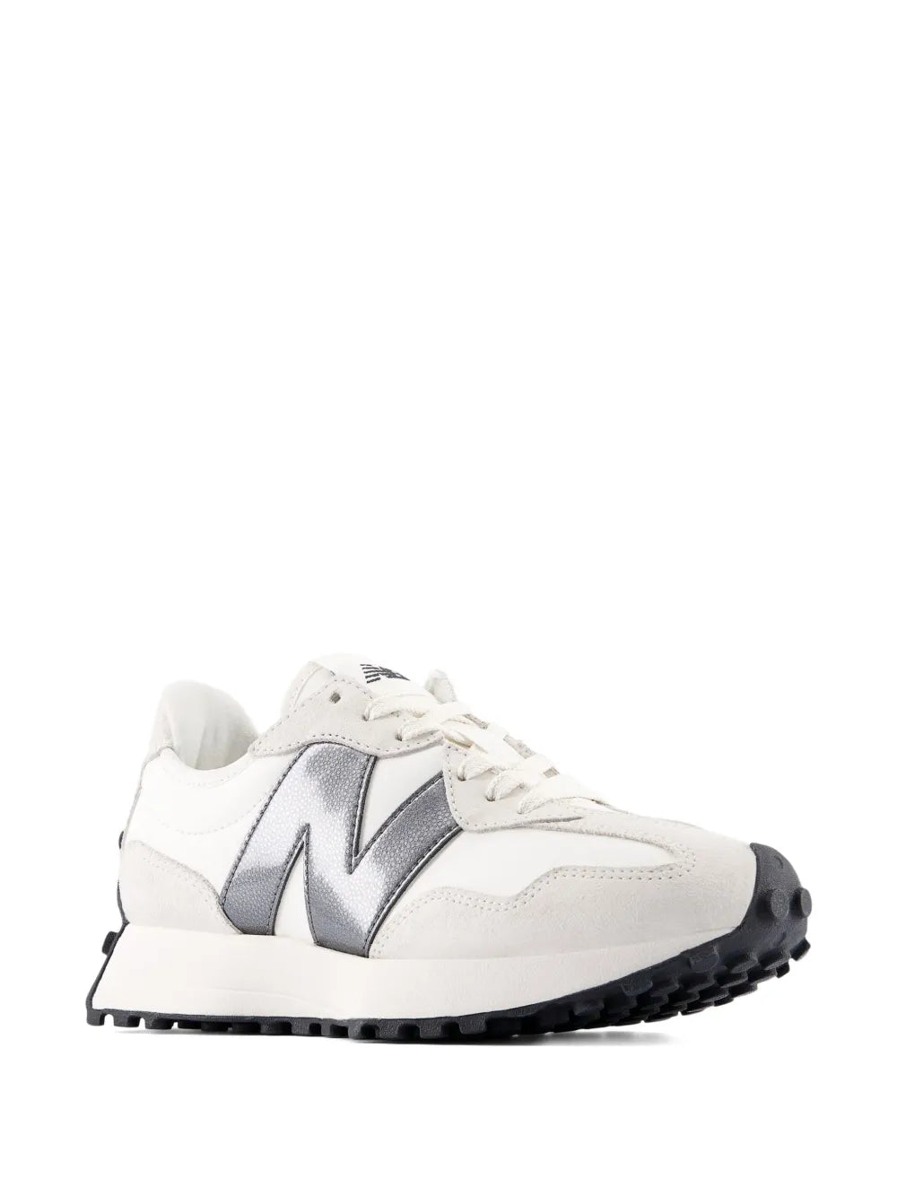 Low-top sneaker side view, white upper with silver/navy N and black tread sole