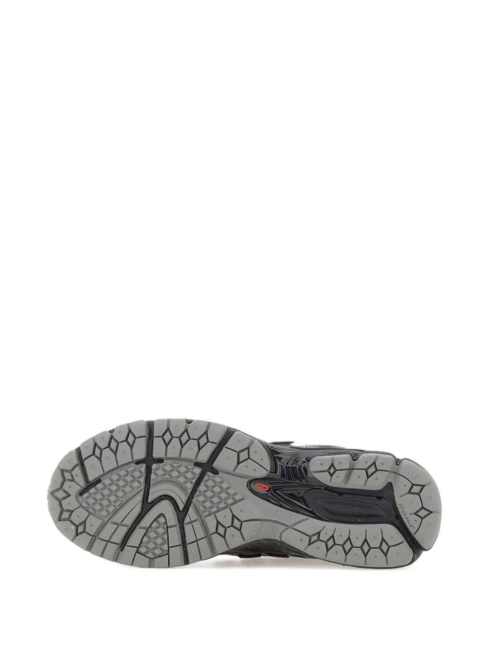 Black rubber outsole with grippy tread and honeycomb pattern