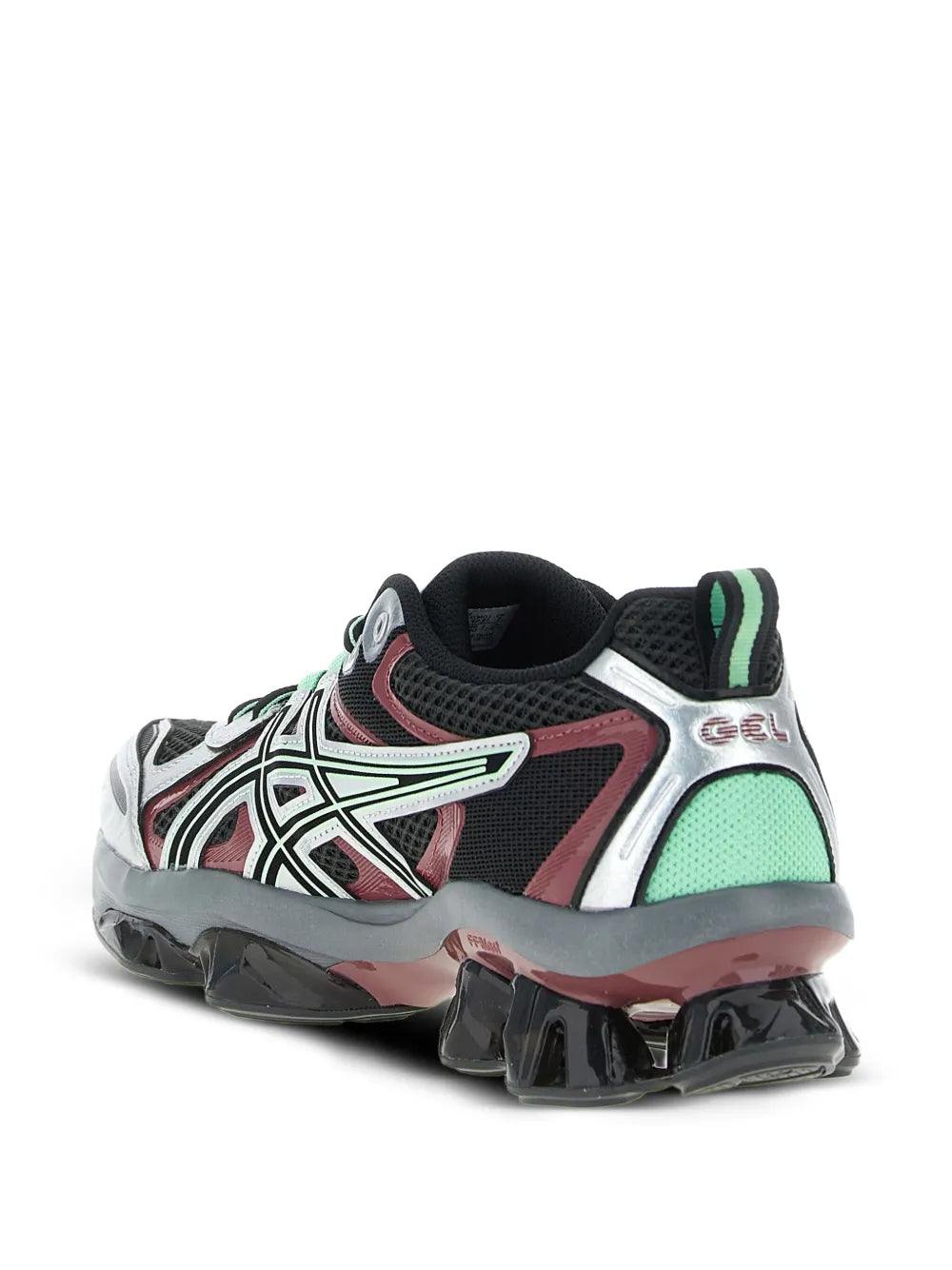 Black ASICS running sneaker with white stripes, mint heel panel, red accents, thick sole