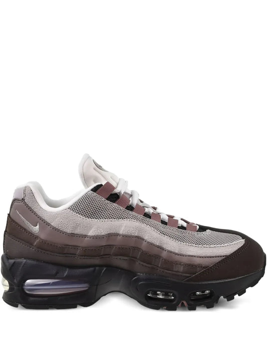Nike Air Max 95 sneakers in dark brown, white, and gray with air-cushioned sole
