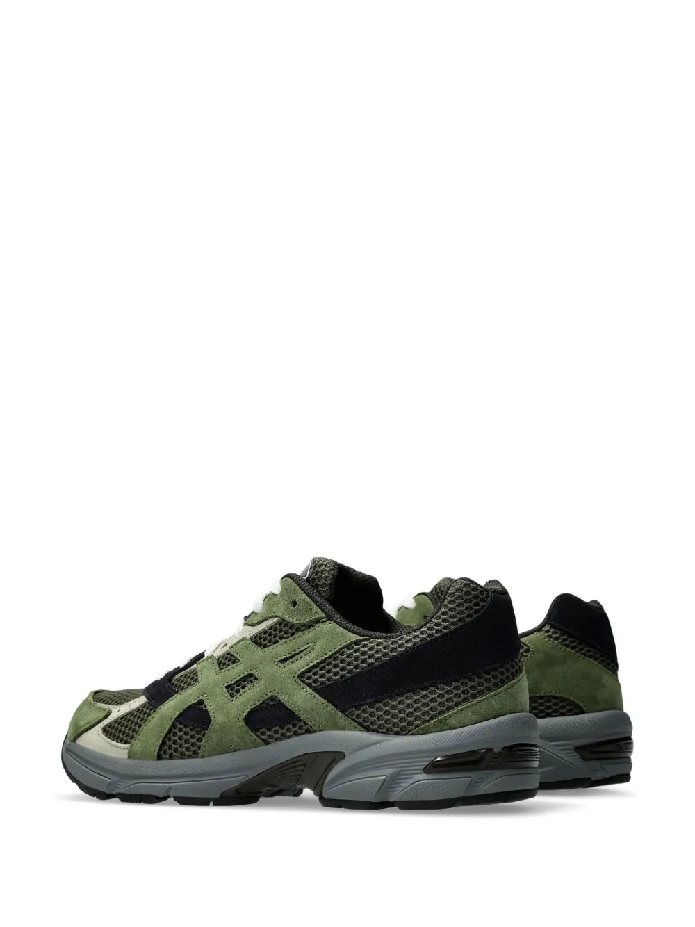 Green and black running shoes with white laces, angled side view