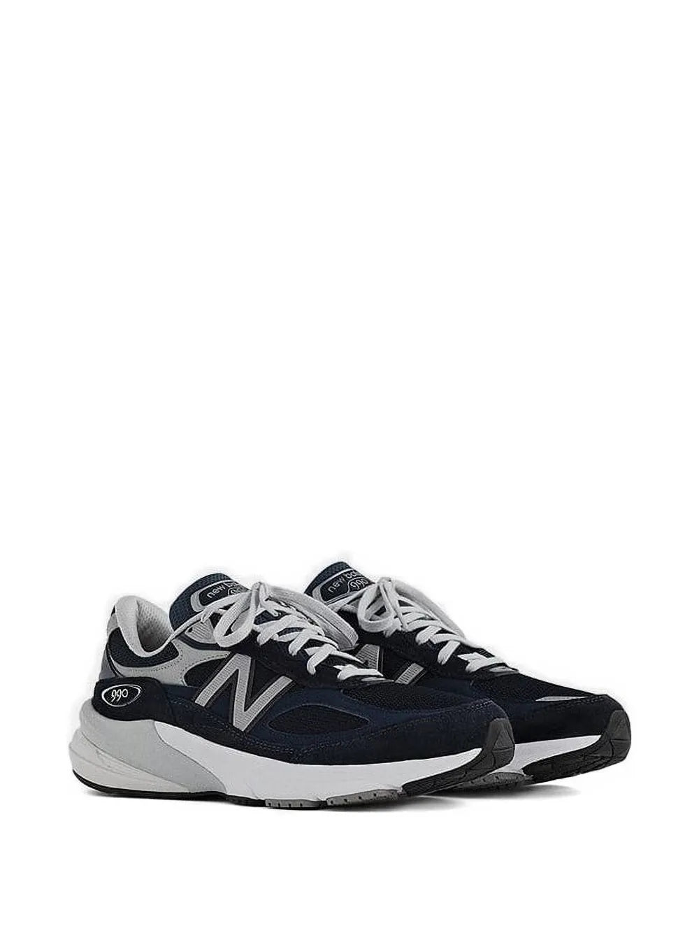 Side-view running sneaker in dark navy with light gray midsole and white accents