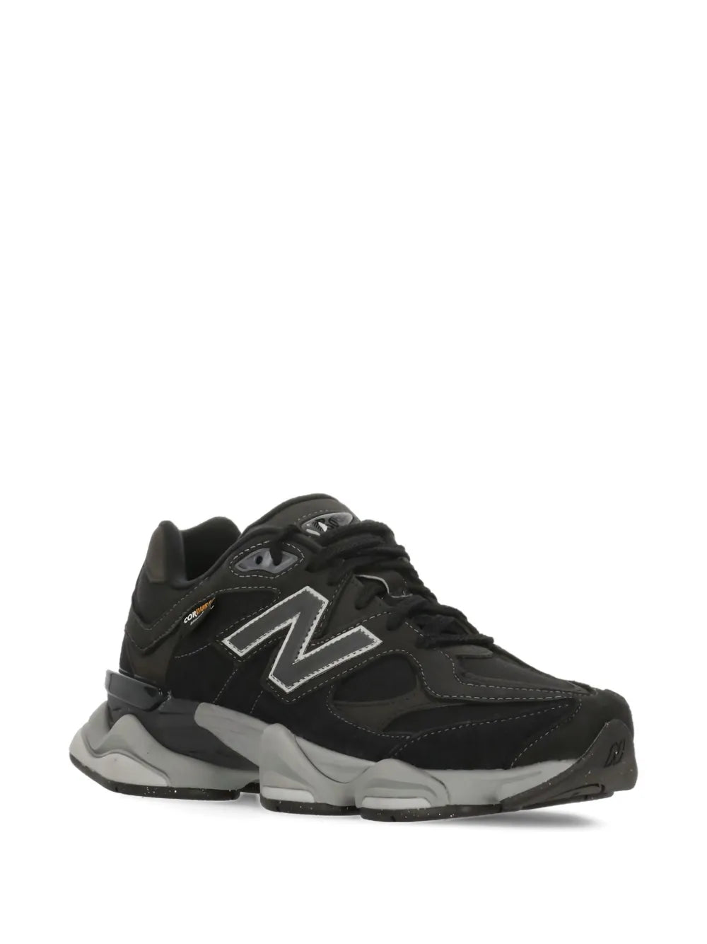 Black low-top sneakers with white N logo and gray midsole