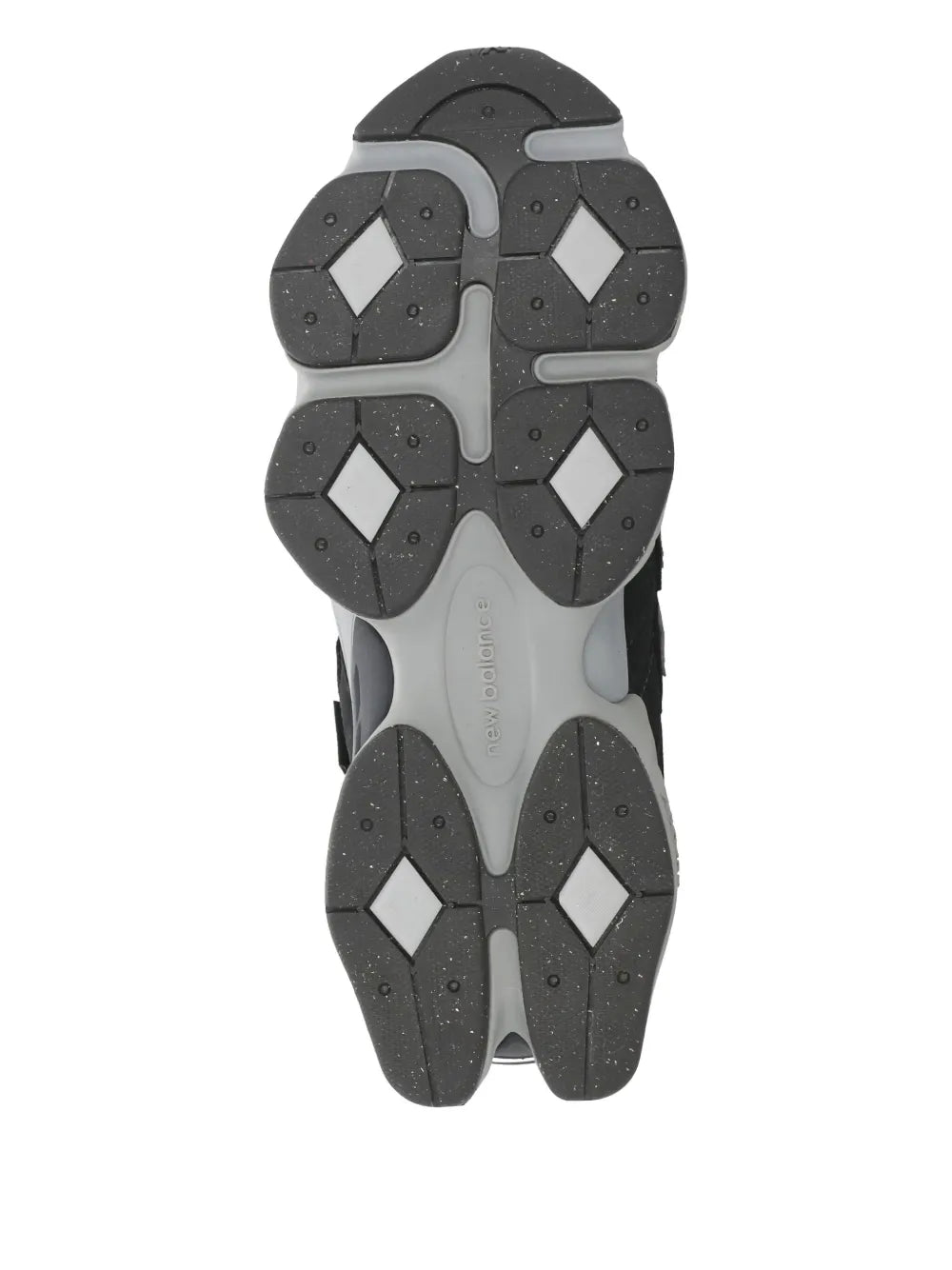 Black rubber outsole with four-panel tread pattern