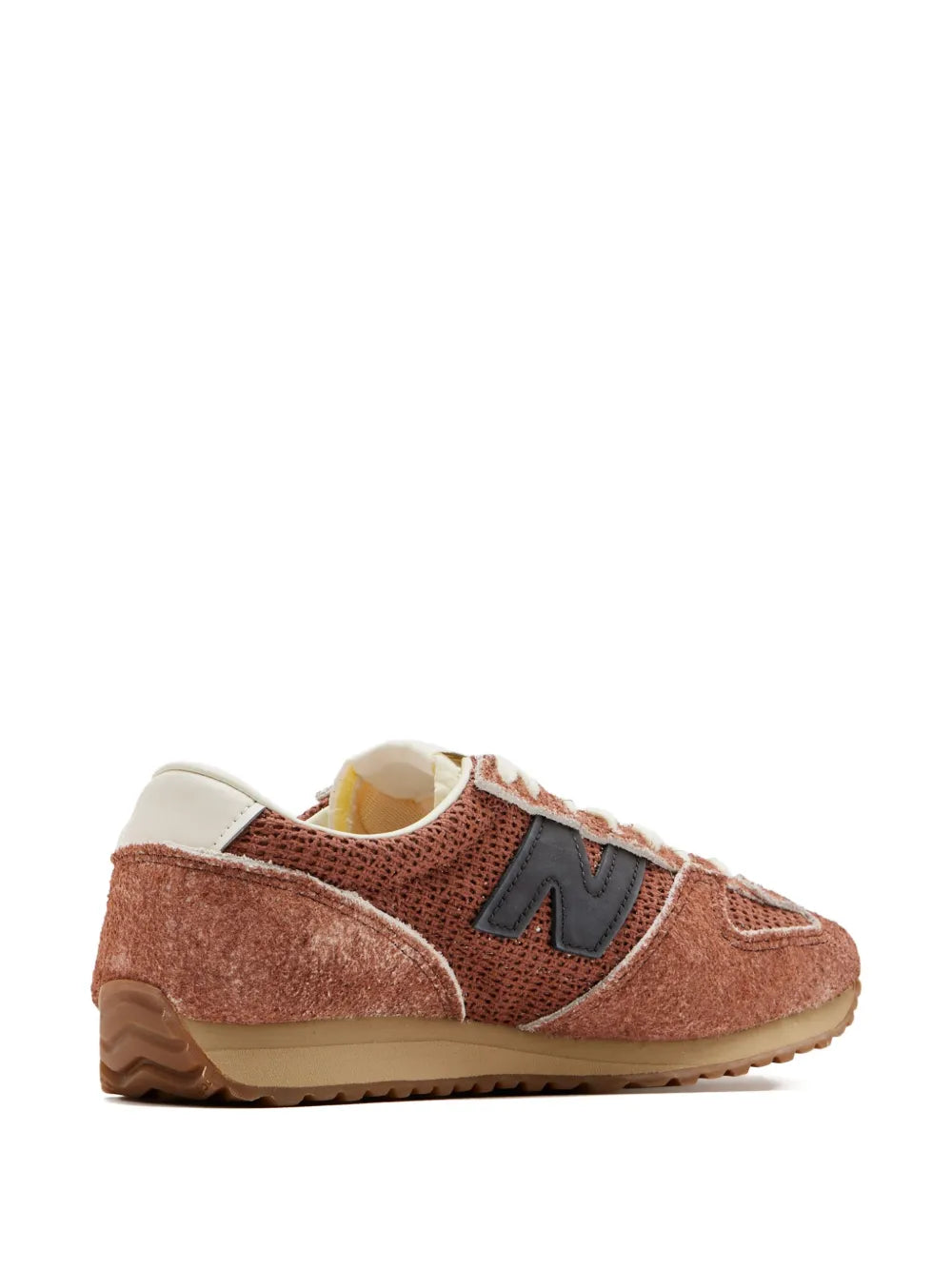 Brown New Balance suede sneakers, 3/4 view with black N logo and gum sole