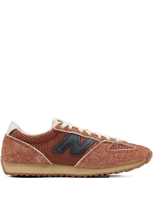 New Balance suede sneakers, brown with black N logo, white laces, gum sole