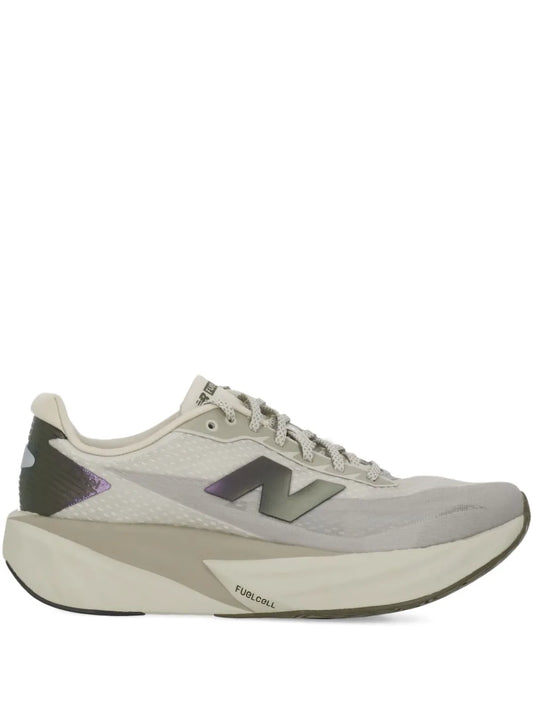 Beige and gray running sneakers with lace-up front and FuelCell logo on sole