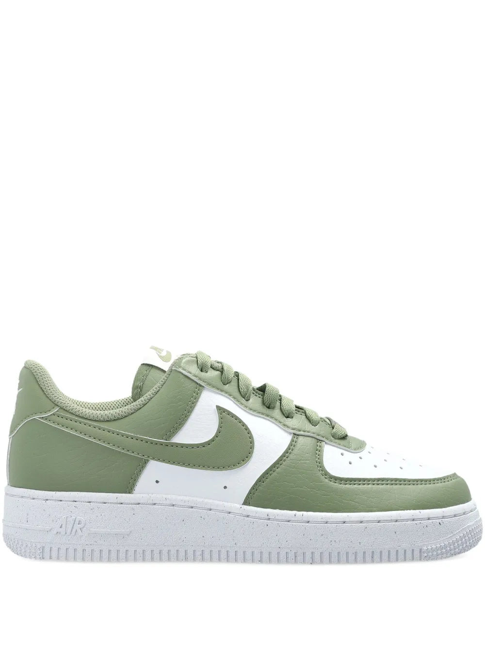 Green and white Nike lace-up sneakers with white swoosh and lace eyelets